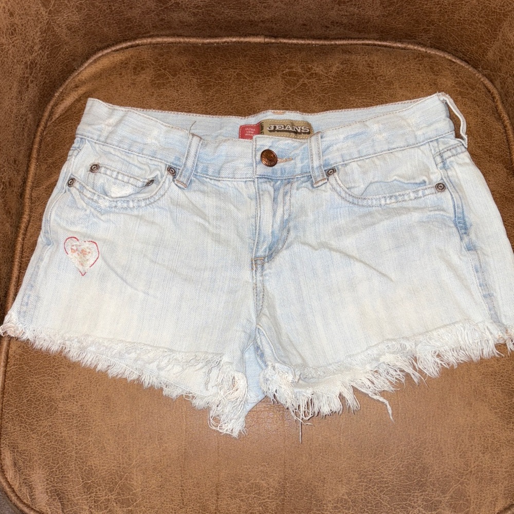 Ultra Low Rise Distressed Light Wash Jean Shorts